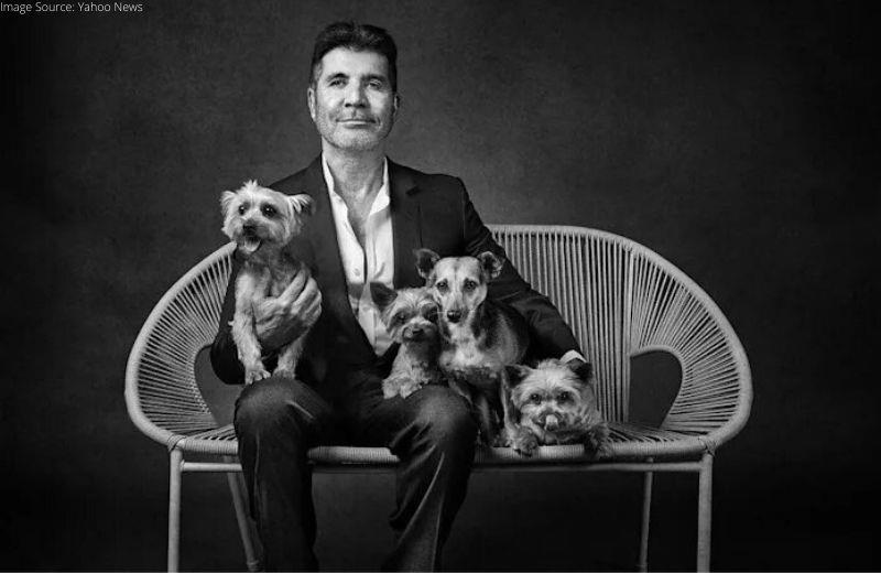 Celebrities pose with their dogs for charity